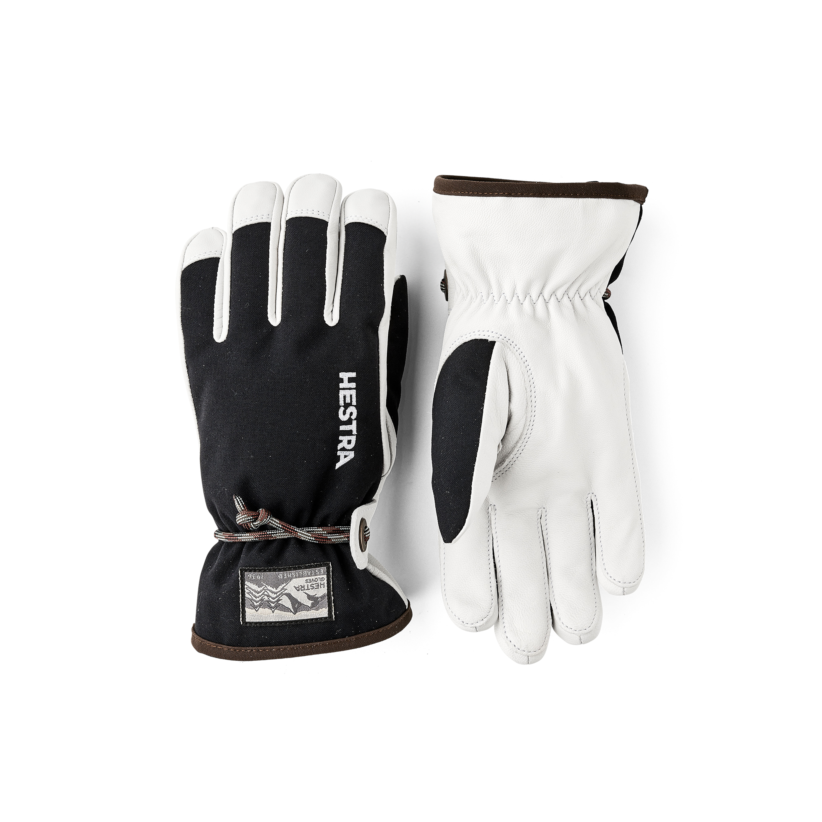 Black children’s glove with white goat leather palm and wrist strap