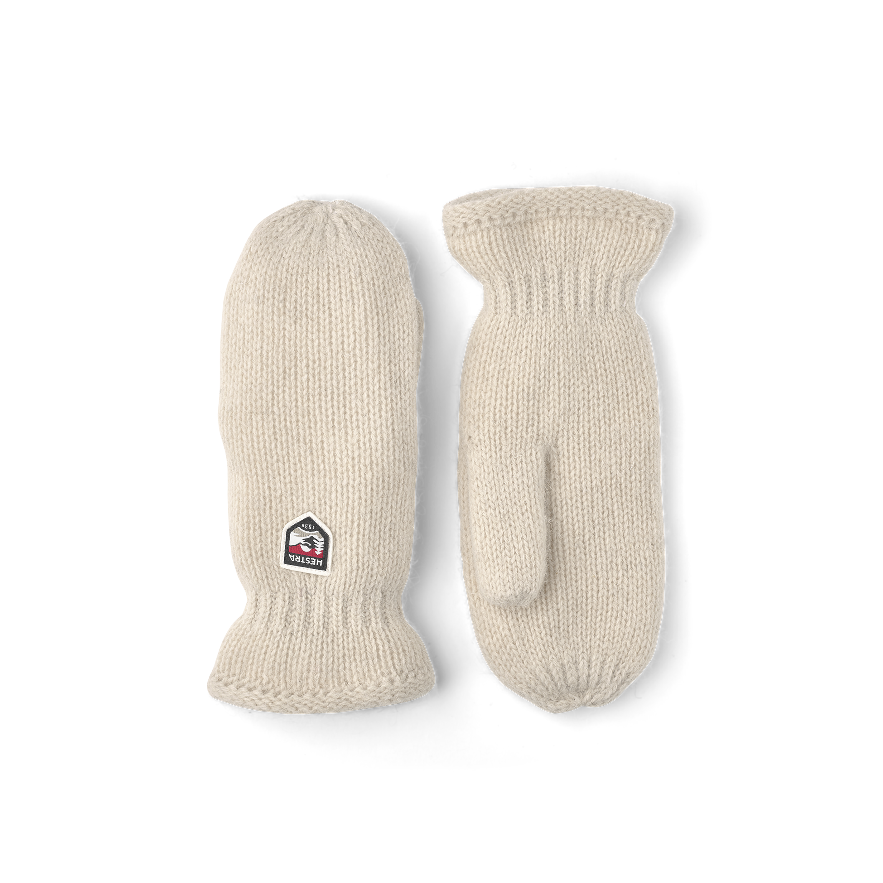 White knitted mitten in Shetland wool