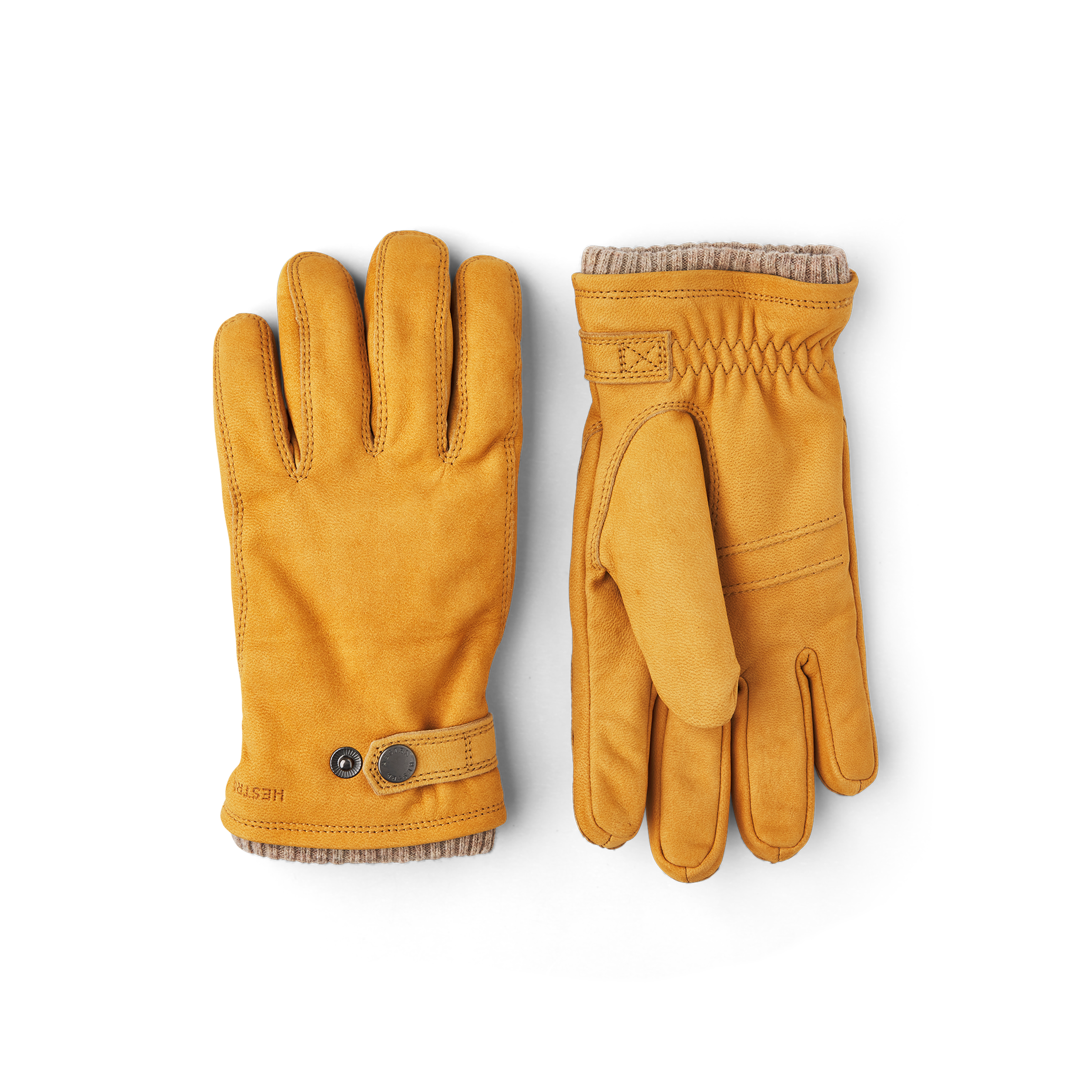 Yellowish-beige machine-sewn goat nubuck glove with leather strap and button