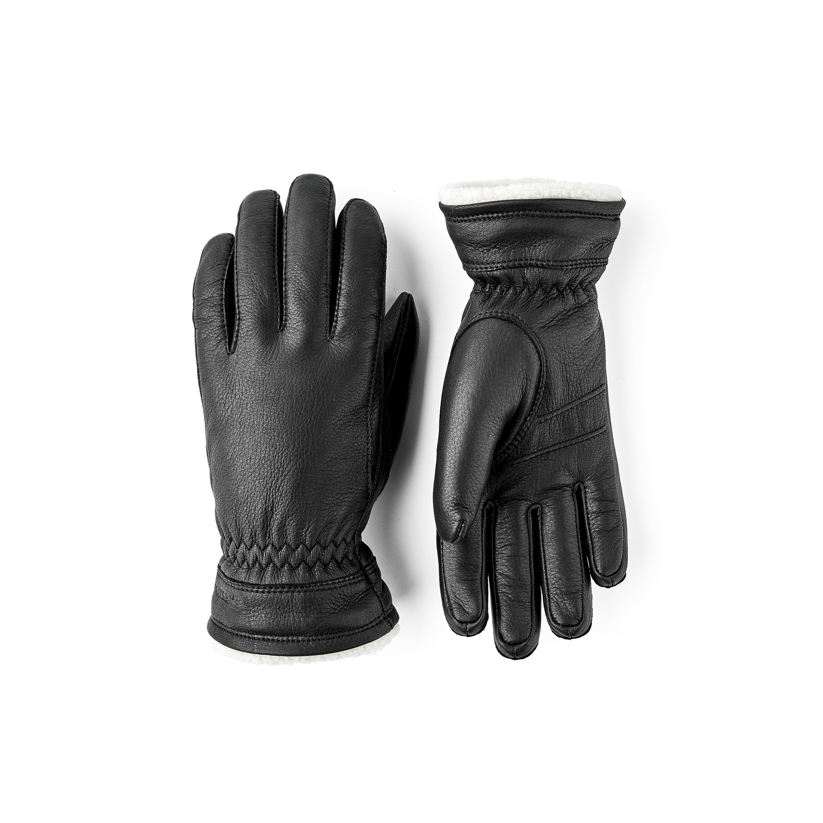 Black machine-sewn deerskin glove with white trim
