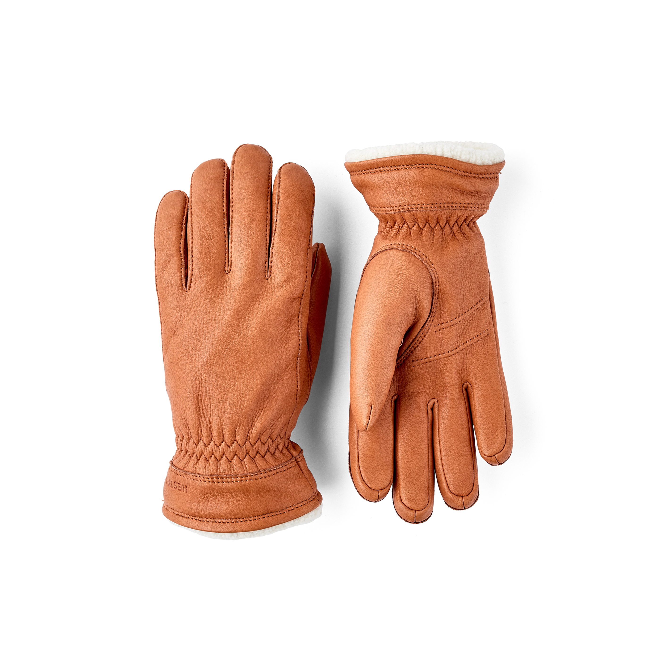 Light brown machine-sewn deerskin glove with white trim