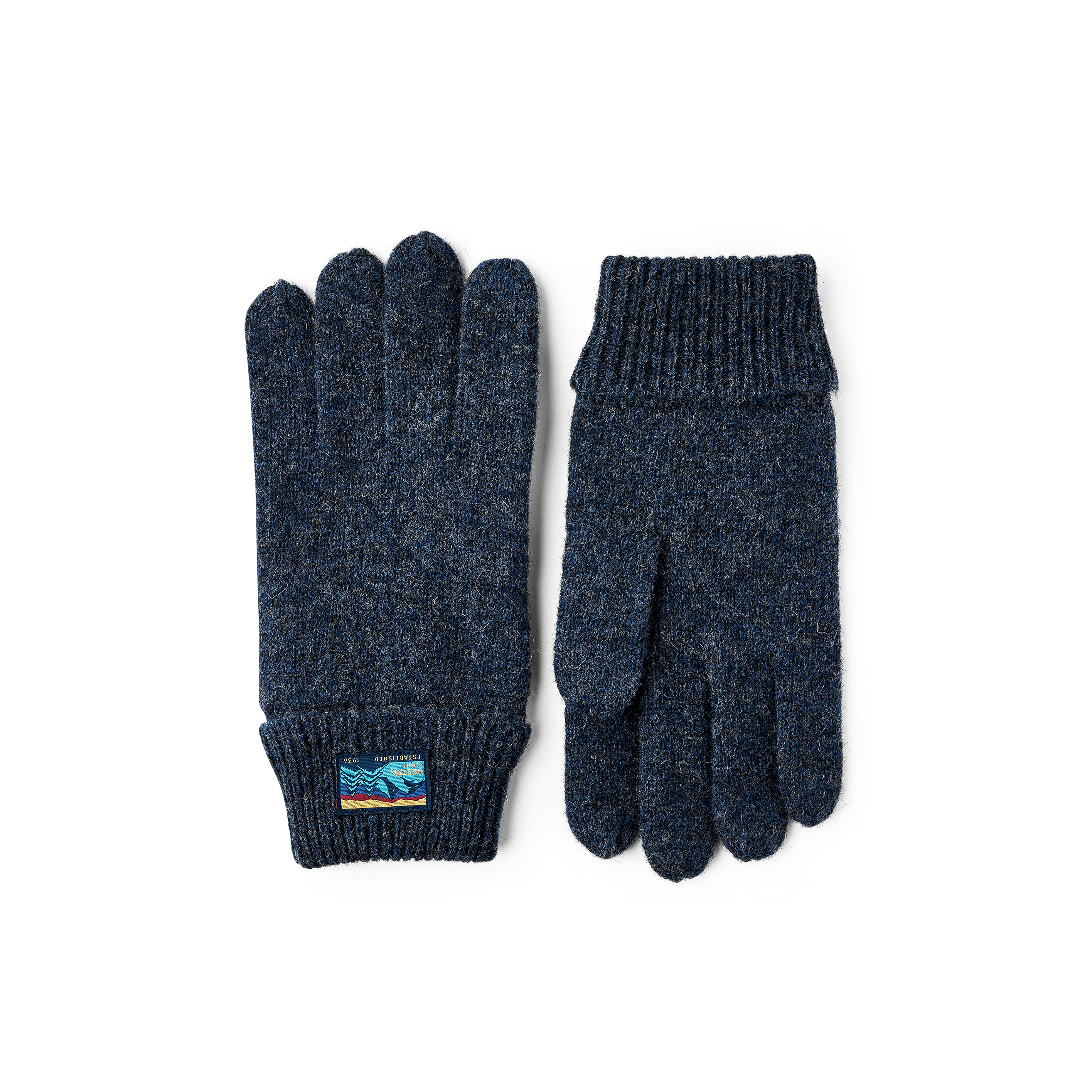 Dark blue glove in mottled wool yarn