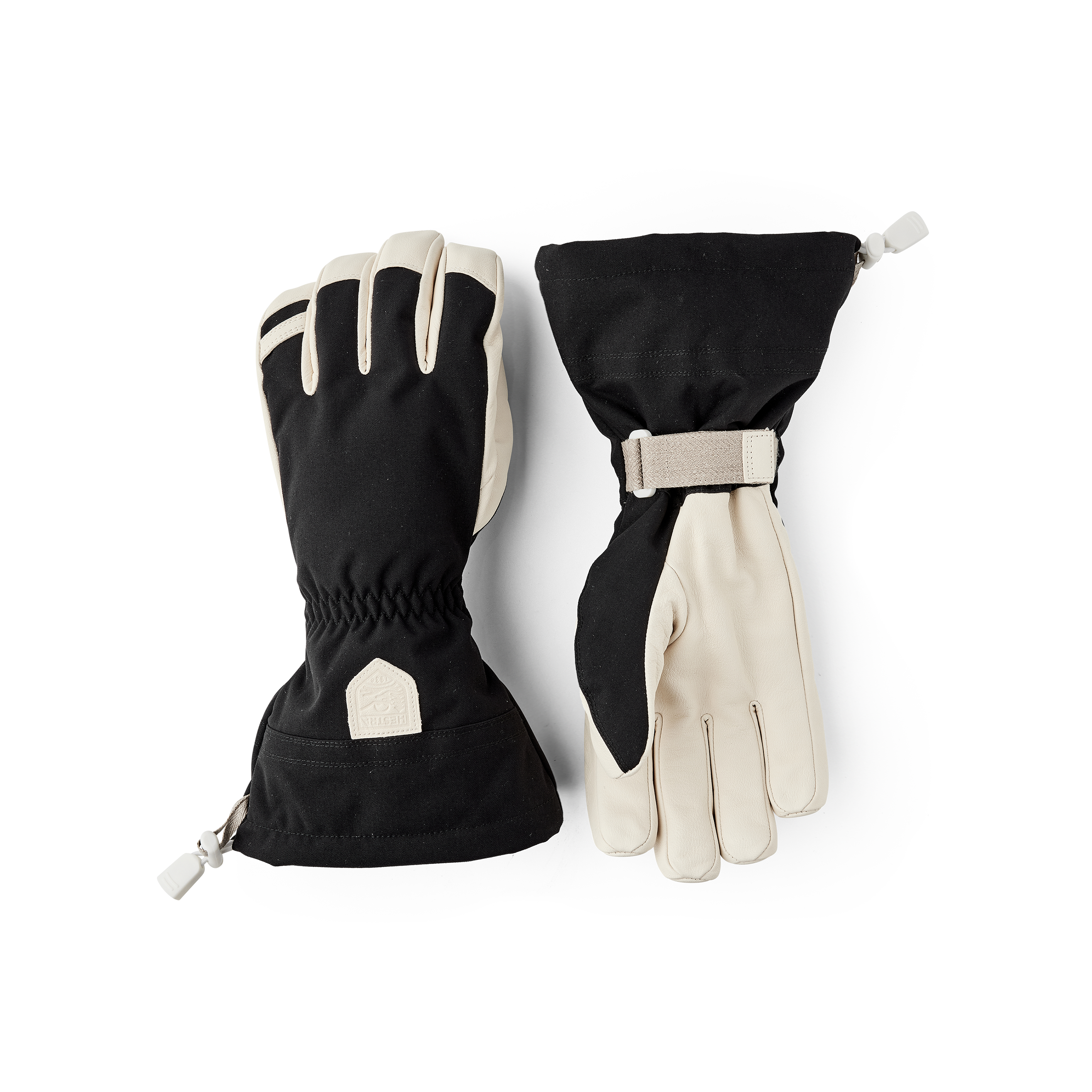 Black ski glove with white goat leather palm